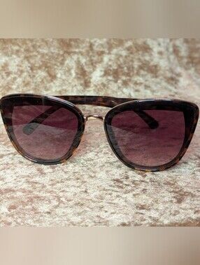 Tortoiseshell Cat-Eye Sunglasses with Purple Lenses